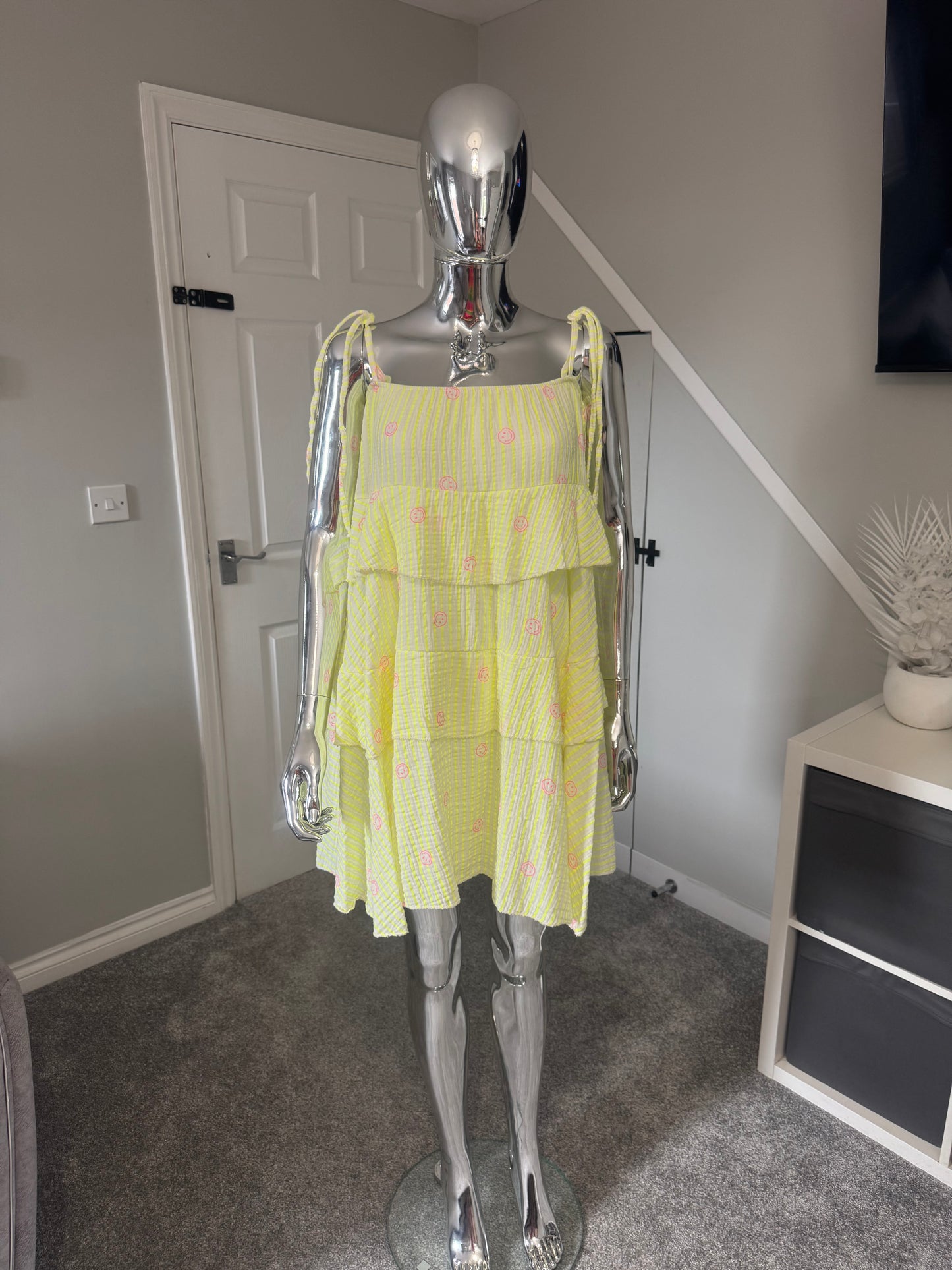 Neon yellow smiley face cheesecloth ruffle dress